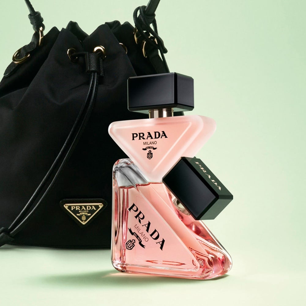 Paradoxe Hair Mist and Paradoxe Eau de Parfum with a Prada nylon handbag.